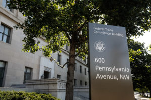 the exterior view of the street sign in front of the US Federal Trade Commission headquarters